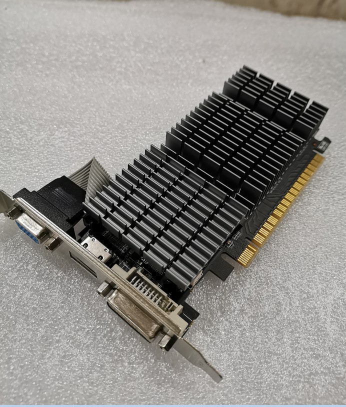 Mute fanless design punching new nameplate GT710 real 2G graphics card low power consumption temperature low 630