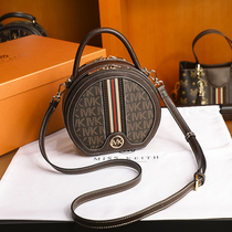  Hong Kong small MK counter 2021 new round cake bag messenger portable leather presbyopia round bag womens bag