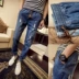 Chàng trai tinh thần xã hội giá rẻ size nhỏ S bó sát lỗ chín điểm quần jeans nam Slim co rút chân bếp quần thời trang nam Cao bồi