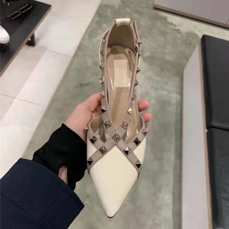 White rivet pointed high heels 5cm European soft leather women's shoes sexy shallow mouth single shoes Baotou stiletto sandals