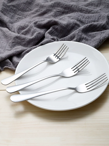 Западная еда тянет на стейк -песок с длинной ручкой