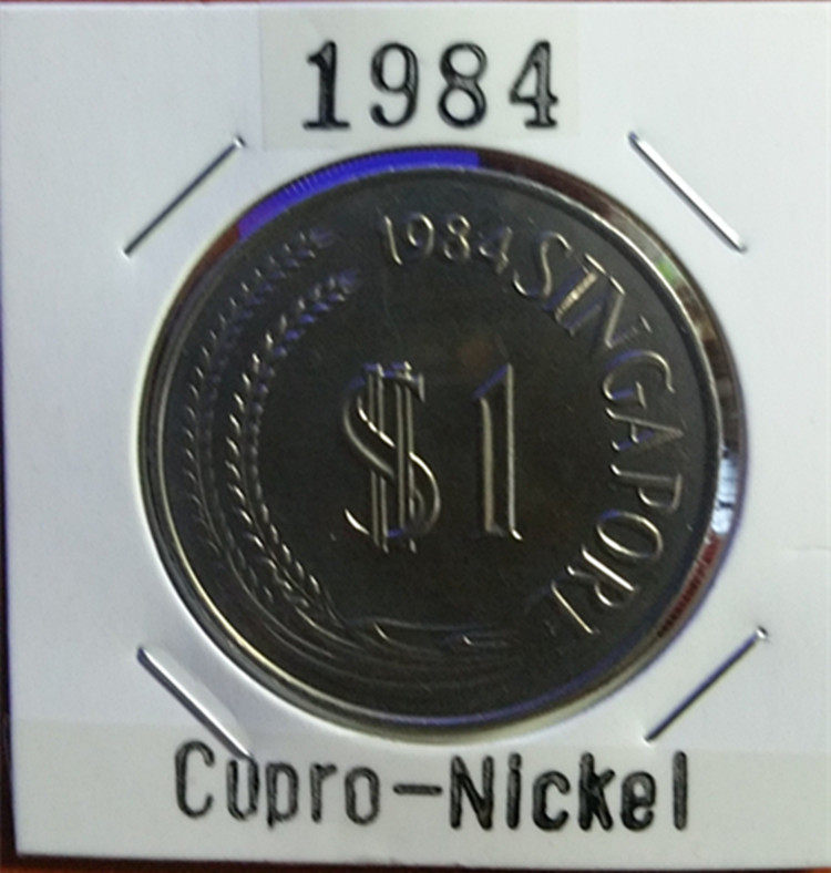 Singapore 1984 $1 lion head coin in action