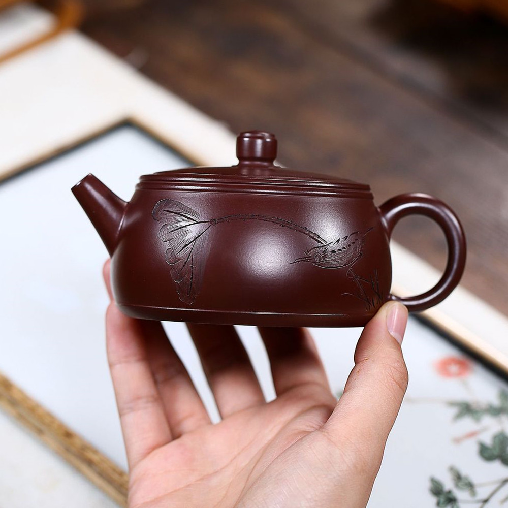 Yixing Purple Sand Pot Virtuoso Xu Feng All Handmade Exploits Hot Selling Raw Mineral Purple Clay Clay Well Column Carved 200cc Ball Holes