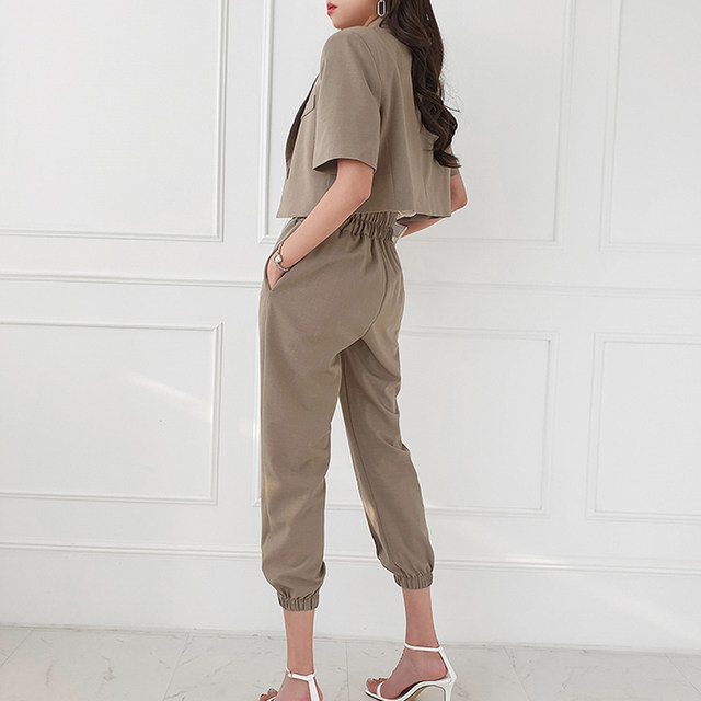 OL workplace two-piece set female 2022 summer Korean style temperament suit small jacket waist cropped pants casual suit tide