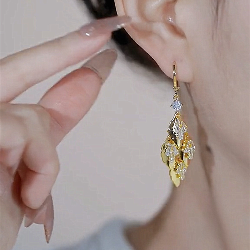 Leaf tassel earrings side profile view