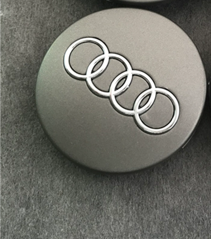 Vỏ trung tâm Audi A3 A4 A6L Q3 Q5 Q7 A5 A7 A8 Q2 logo trung tâm vỏ lốp logo logo trung tâm lo go xe hoi tem dán kính lái ô tô 