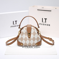 Hong Kong counter women's bag 2024 summer new trend hot simple and versatile genuine leather handheld shell bag single shoulder crossbody bag