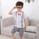 Mùa hè trẻ em phù hợp với tay áo ngắn Quần short nhà 100% cotton nam và nữ quần áo trẻ em ngắn tay hai mảnh