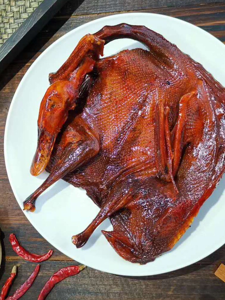 Hunan sauce plate duck Qiao Zai 260g sauce plate duck whole air-dried spicy snacks snacks burst spicy flavor cooked food wine