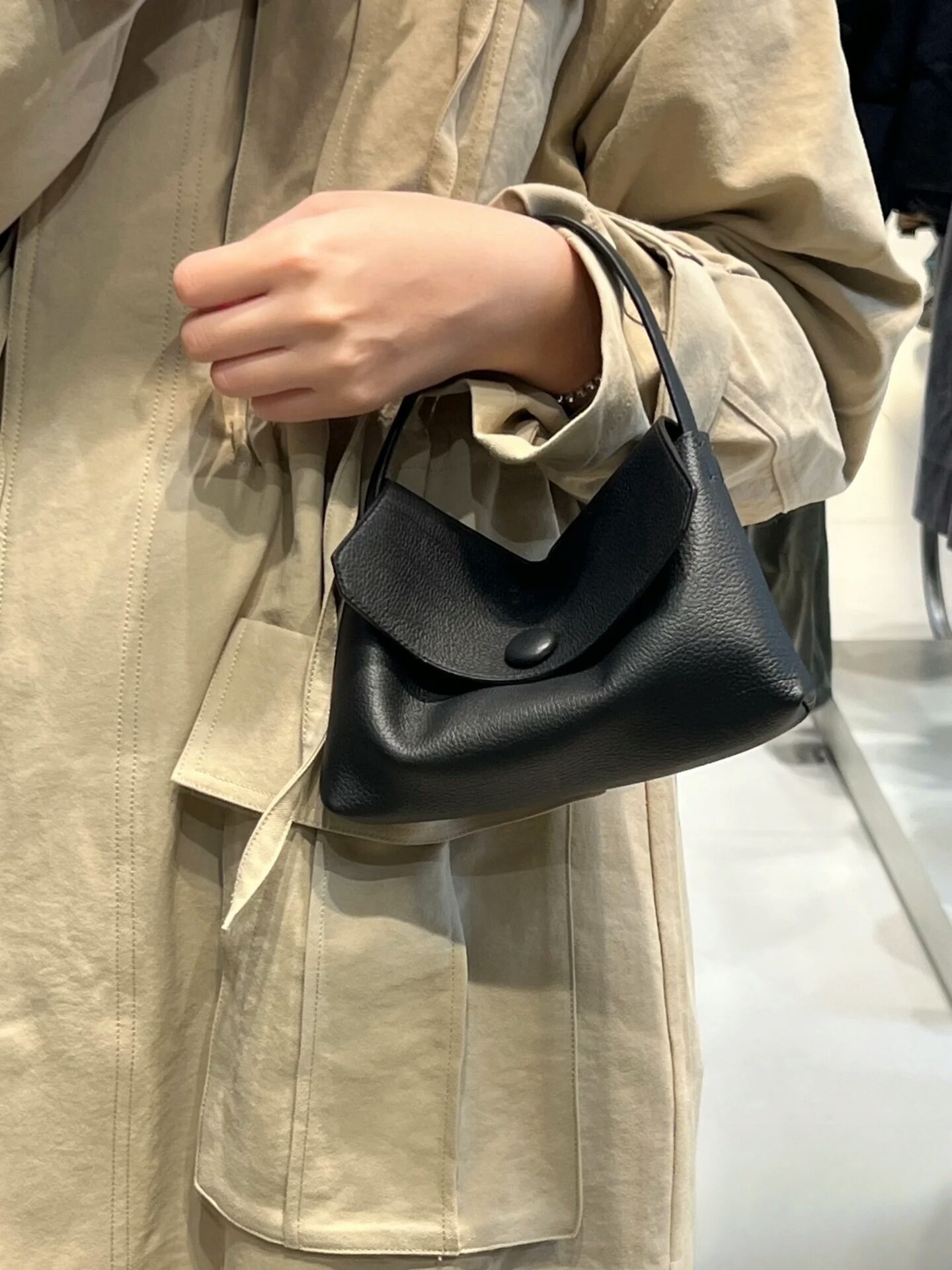 Клатч the*row新款sally高质感胎牛皮手提女包极简纽扣手机口红包手拎包