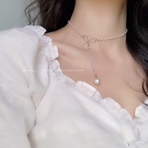 Temperament bow pearl necklace female design sense minority personality simple Lady choker tide Net red accessories