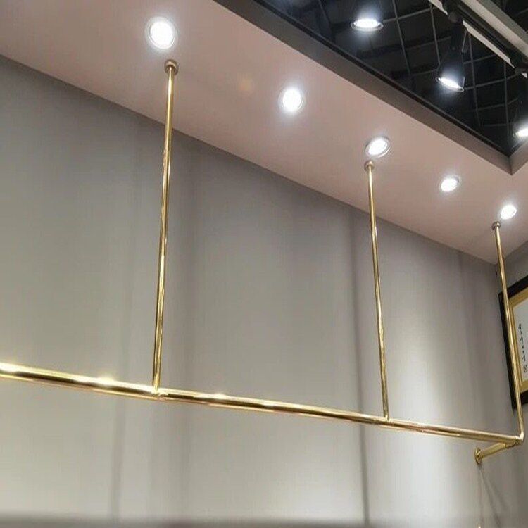 Stainless steel wedding dress display rack clothing store wall hanging titanium alloy brushed suspended ceiling dress hanging hanger custom