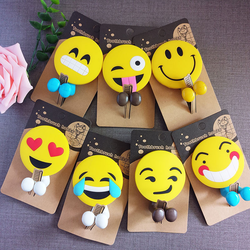 Smiley toothbrush holder Children's new toothbrush clip suction wall rotating hook Smile cartoon Japanese soft rubber toothbrush holder