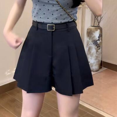 The new design of the 2026 summer black suit shorts for women is high-waisted and slimming. a thin A-line wide-leg skirt is worn over it
