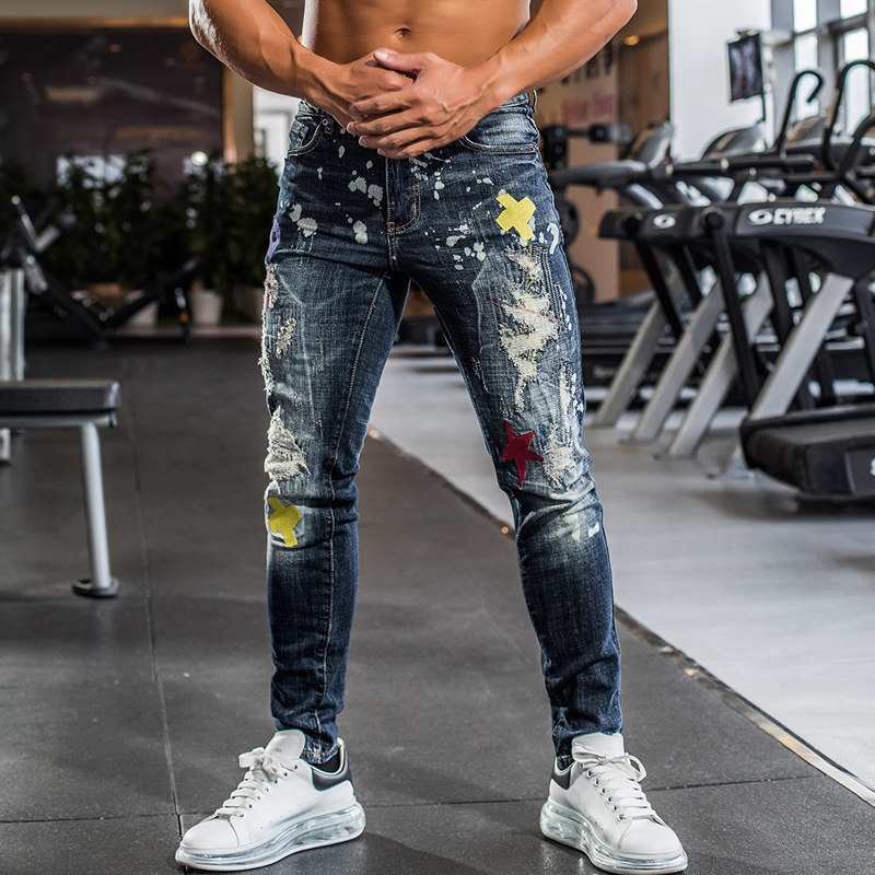 Iron wolf sports jeans men's autumn and winter elastic hole decals loose fitness muscle training cigarette pants tide