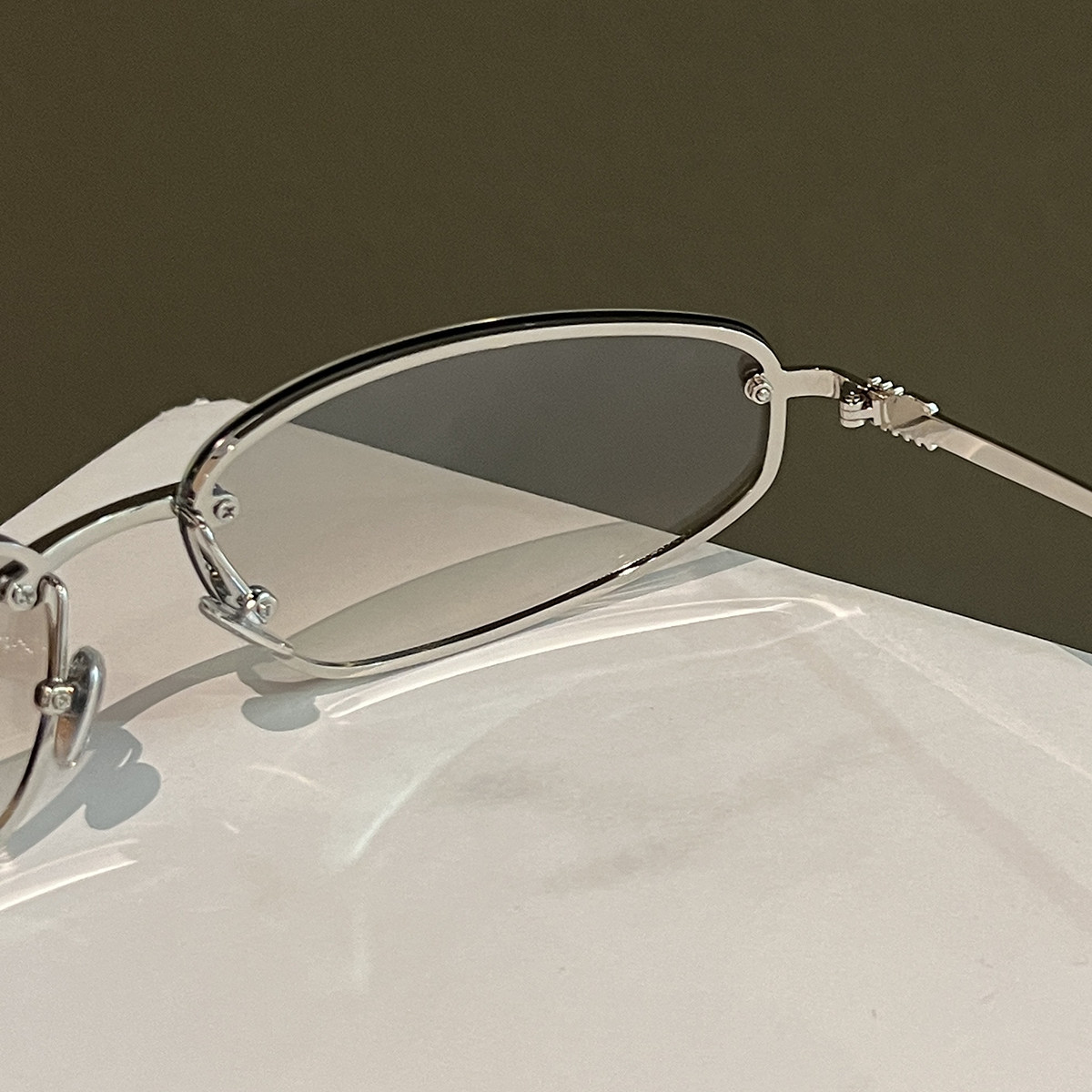 European and American Frameless Mercury-Colored Y2K Oval Sunglasses 2025 New Versatile High-End Photo-Taking Styling Sunglasses