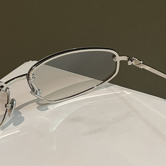 European and American frameless mercury y2k oval sunglasses 2025 new style versatile high-end photo concave shape sunglasses