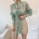 Korean chic niche all-match neckline streamer glossy shirt + high waist A-shaped pu leather skirt short girl