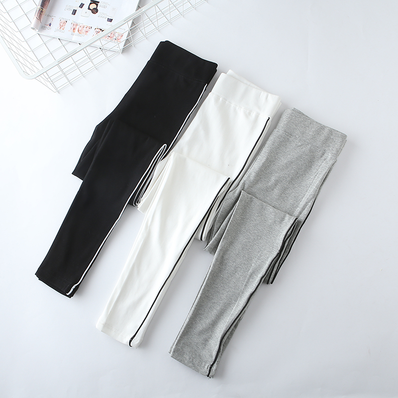 Mùa xuân và mùa thu dày quần legging thể thao màu trắng sọc dọc kéo dài dệt kim cotton đen chân chín quần quần ấm mùa đông phụ nữ