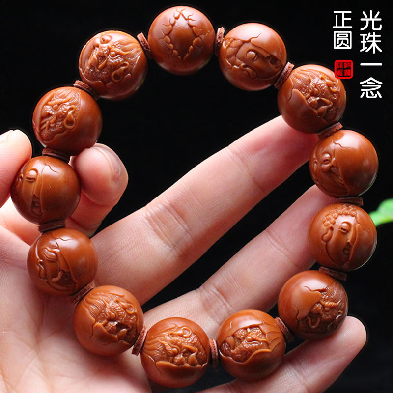 Suk olives nuclear carvings pure hand engraving iron core positive circle bas-relief The olive hut between the men and women