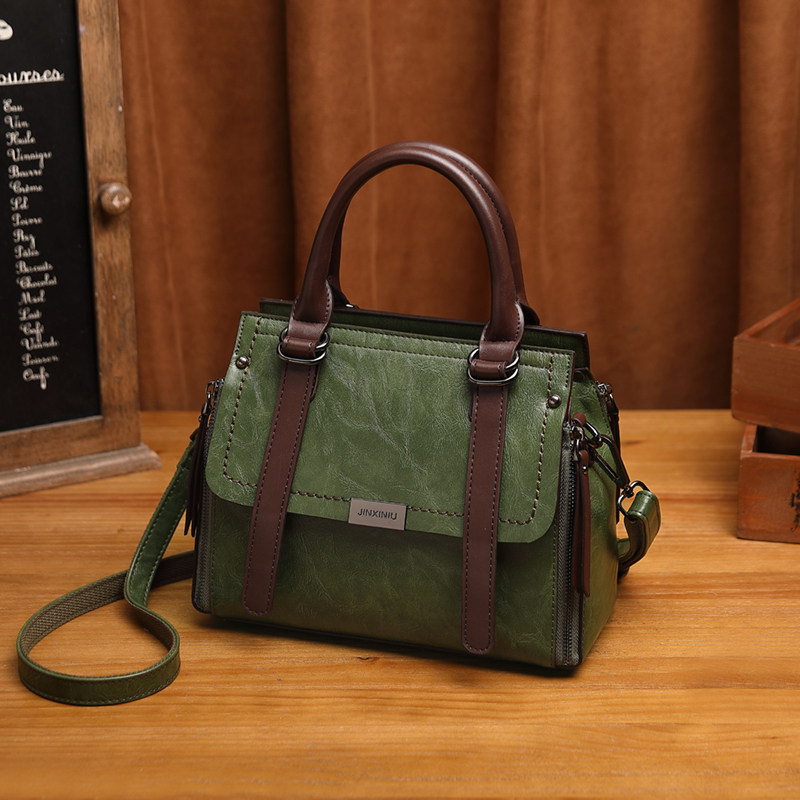 European Standing Fashion Retro Handbag Woman 2022 new genuine leather women's bag Han version Jane about 100 hitch satchel shoulder bag