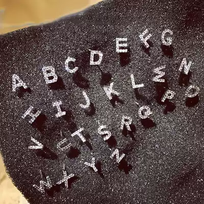 Korean fashion simple English letters hypoallergenic ear needles simple diamond-set zircon earrings men's and women's ear jewelry accessories