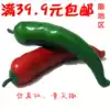 Full simulation of fake vegetables and fruits model ornaments Simulation of fake red and green pointed pepper decorations shooting video