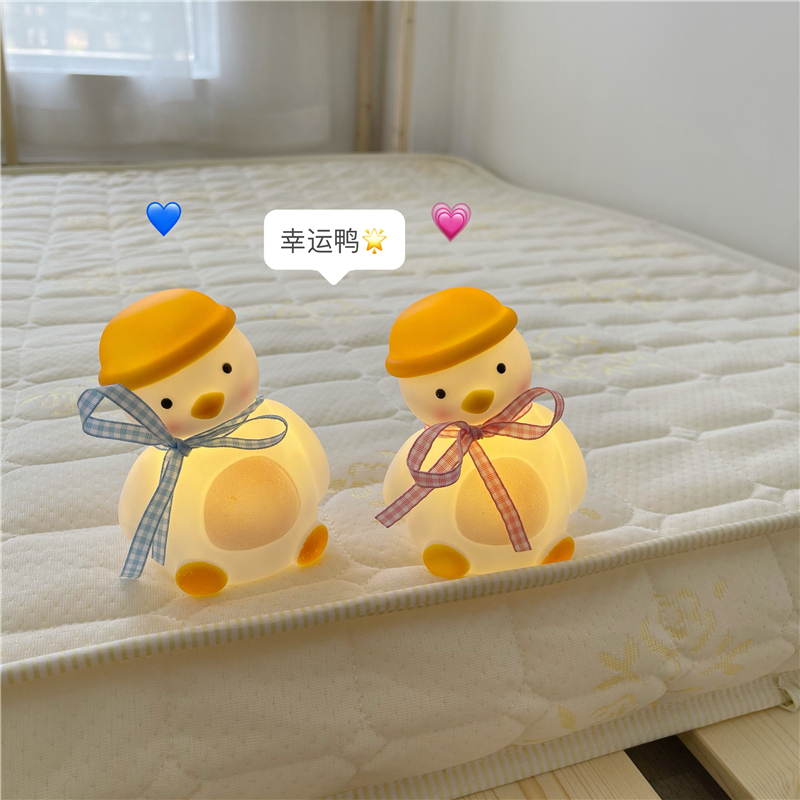 Korea ins cute crooked duck LED lucky duck ribbon with small night light room Bedroom bed head lamp swing piece dorm room