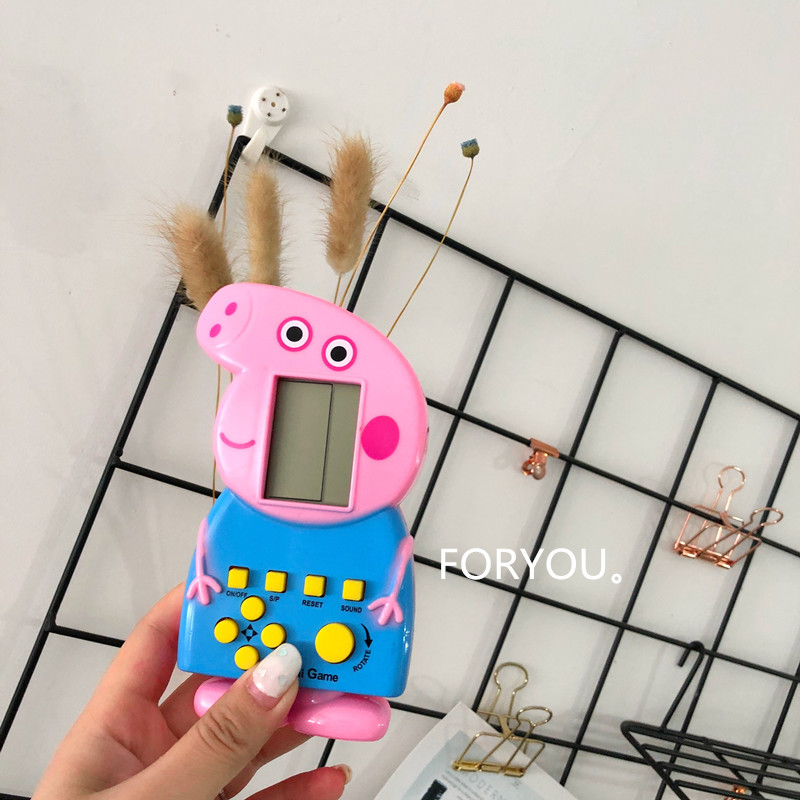 Rung người xã hội với heo con phim hoạt hình dễ thương retro hoài cổ cổ điển Tetris game console cầm tay máy chơi game tay cầm