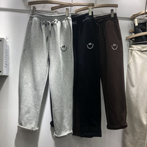 Plus velvet pants womens winter new solid color smiley face embroidery loose padded casual pants Joker sports pants 98256