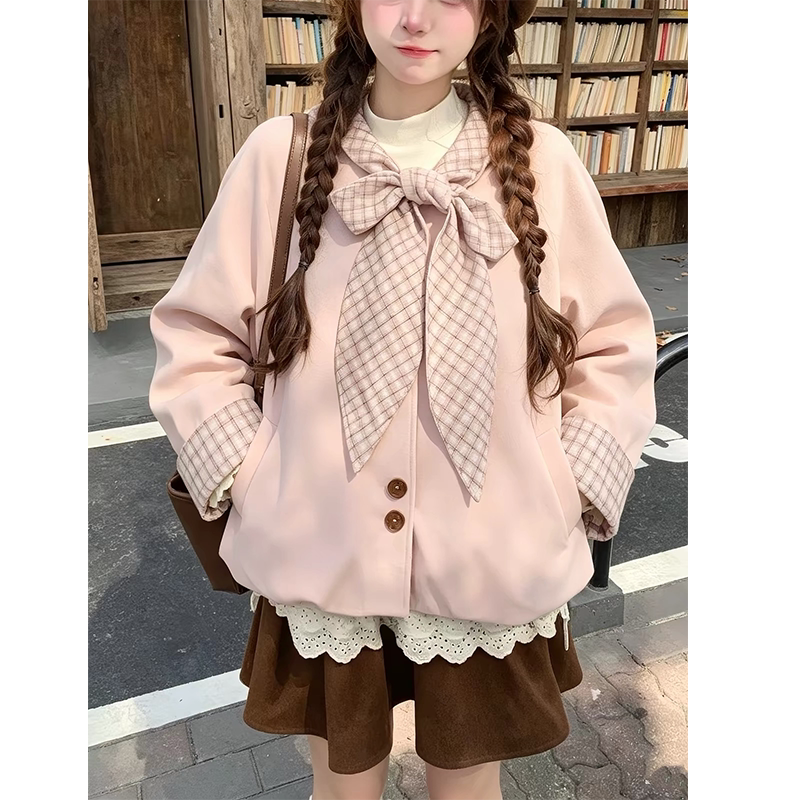 Women's short, sweet pink trench coat with a bow-tie plaid patchwork design, perfect for autumn.