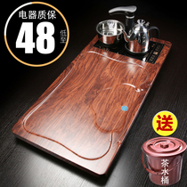 Tea tray with electromagnetic stove integrated household boiling water Kung Fu tea set automatic whole solid wood small tea sea table holder