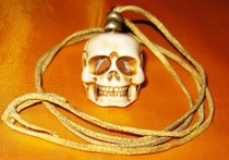 Staghorn skull hanging sheepskin lanyard old copper top beads