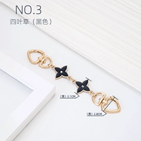 Прямо золотое черное четырехлистное цепь растяжения травы