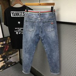 Trendy brand Internet celebrity elastic small-foot jeans for men, Korean version, slim and spiritual, personalized embroidery, versatile nine-point pants