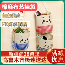 Xinjiang Loulan department store cartoon fabric wardrobe storage hanging bag cotton and linen door hanging storage bag sundries storage