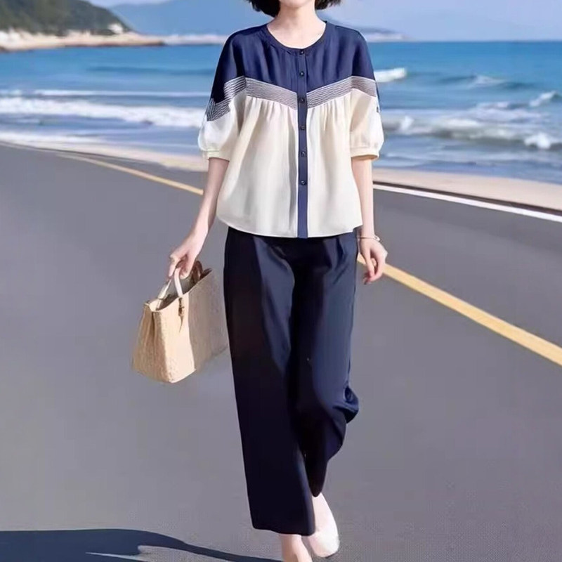 Casual Sports Suit for Women, Summer 2026 New Style, Fashionable and High-End, Mom's Shirt, Short-Sleeved, Nine-Point Pants Two-Piece Set Casual Sports Suit for Women, Summer 2026 New Style, Fashionable and High-End, Mom's Shirt, Short-Sleeved, Nine-Point Pants Two-Piece Set