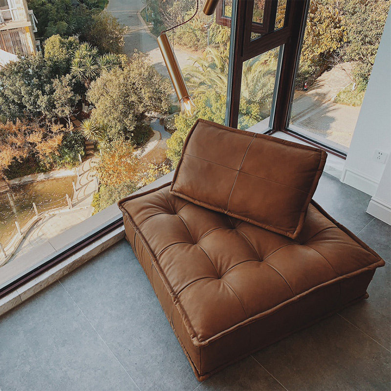 Italian-style minimalist real leather sofa light extravagant single block industrial wind Italy modern minimalist Personality Creative Sofa 
