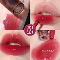 This color is so true. Womens lip gloss water-glossy mirror surface moisturizing non-fading non-stick lipstick affordable for students whitening