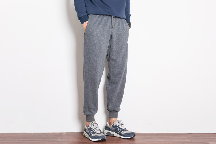 Mùa đông và mùa đông quần thể thao quần nam rạng rỡ cotton giản dị cộng với quần nhung lỏng chân đóng quần Harlan Wei thủy triều quần bò nam