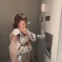 Mushroom mushroom you want for temperament and cuteness it has both sides with a hat and horn buckle.