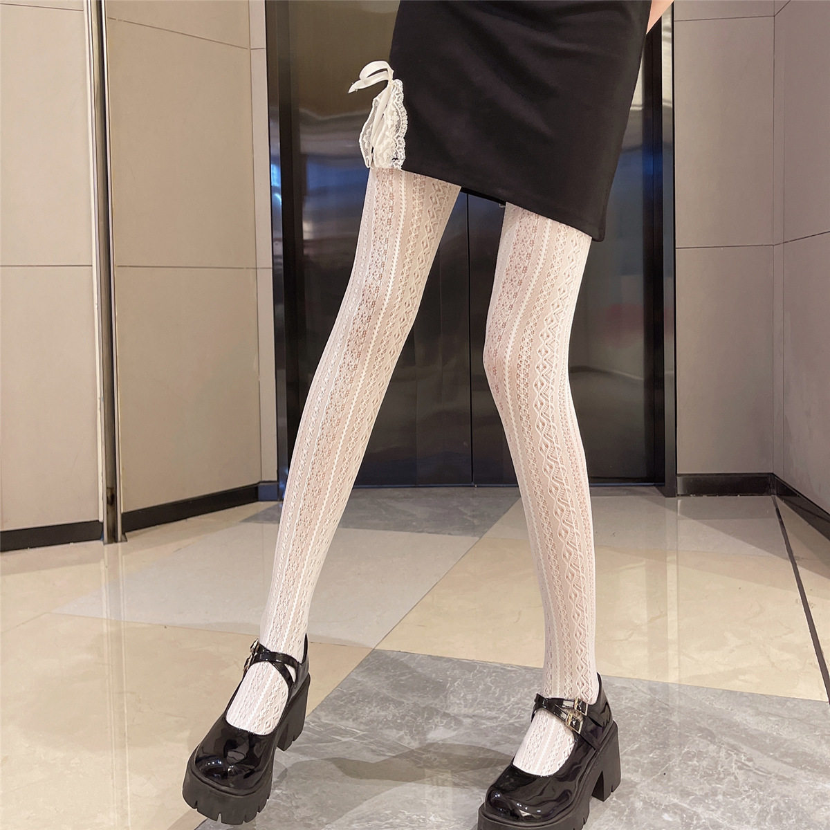 (BHZ) Day of the day Lori young girl sweet retro milk white Lolita hollowed-out vertical weave jacquard pantyhose JK