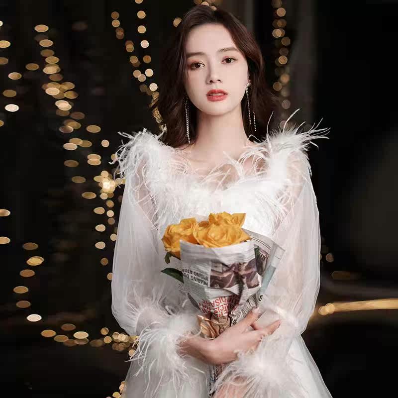 Annual meeting evening dress female 2021 new white long version long sleeve feather atmosphere elegant host banquet evening dress