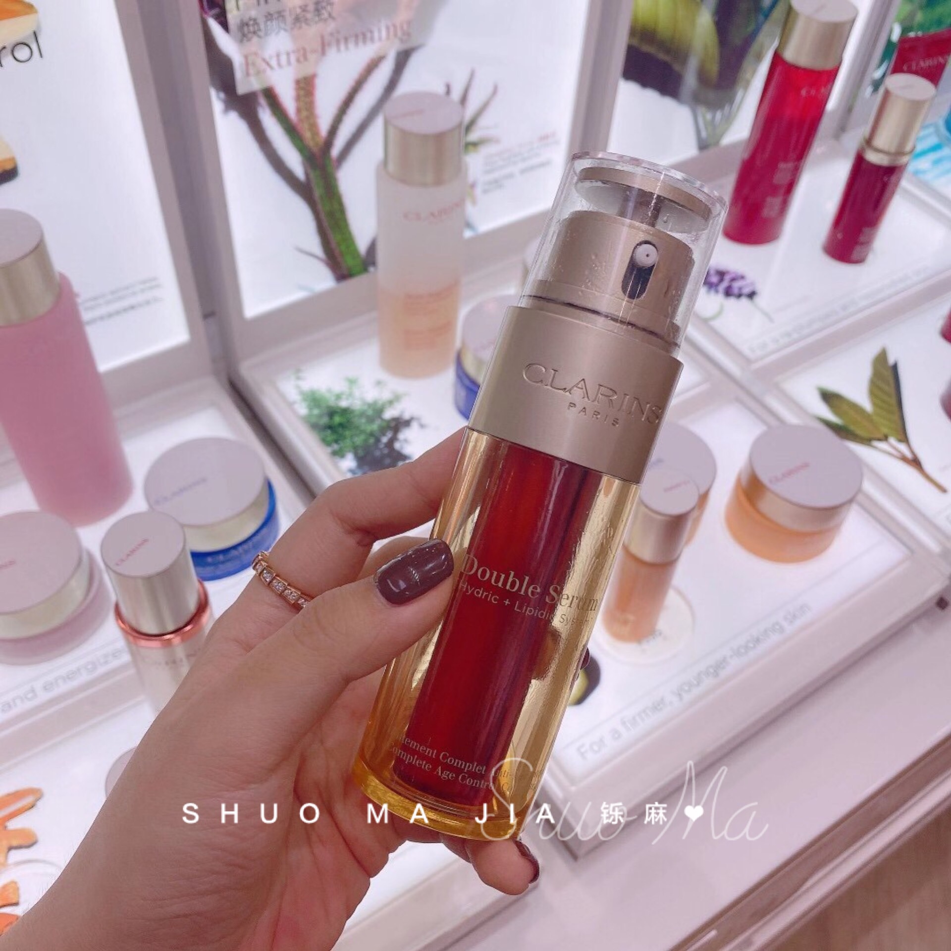 Nước hoa hồng Clarins Tinh chất tái tạo da mặt Clarins Double Extract Essence Moisturizing Activation Brightening 50ml tinh chất trắng da