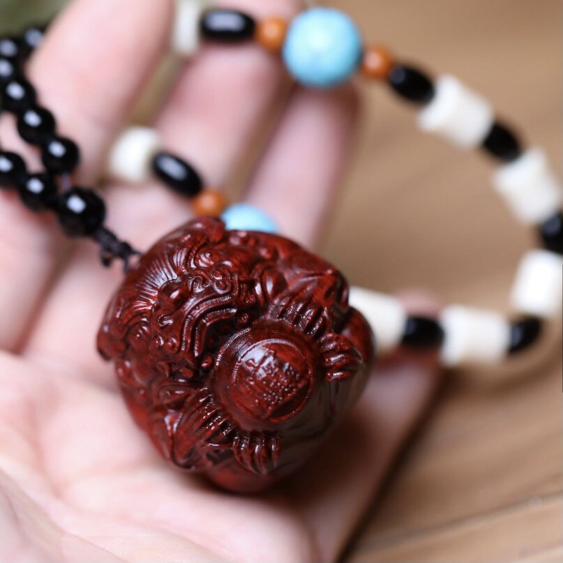 Finger twist retro big leaf red sandalwood mahogany carving Pixiu holding ball text play handle car key pendant