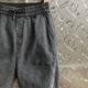 2024 Spring New Men's Jeans Small Foot Nine-Point Pants Elastic Solid Color Leg-tie Harem Pants Trendy Pants Kuaishou ແບບດຽວກັນ