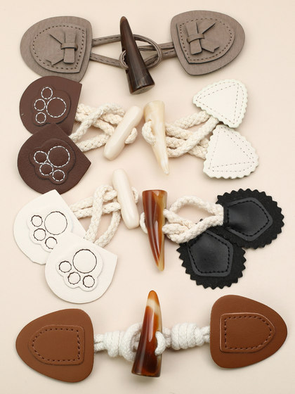 高档牛角扣扣子大衣衣服女搭扣对扣黑色皮扣外套儿童装饰纽扣配件