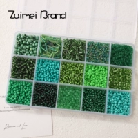 Набор из сетки 15#15 | Темно-зеленые рисовые бусины и бусины-трубочки по 10 грамм в сетке, около 150 грамм.