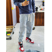 (Radish Cooperative) Zhen Ge with winter New velvet toe casual pants breasted small foot sports pants men