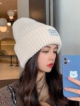 Japanese autumn and winter face small Joker Korean ear protection wool hat Korean version of knitted loose warm pile cap